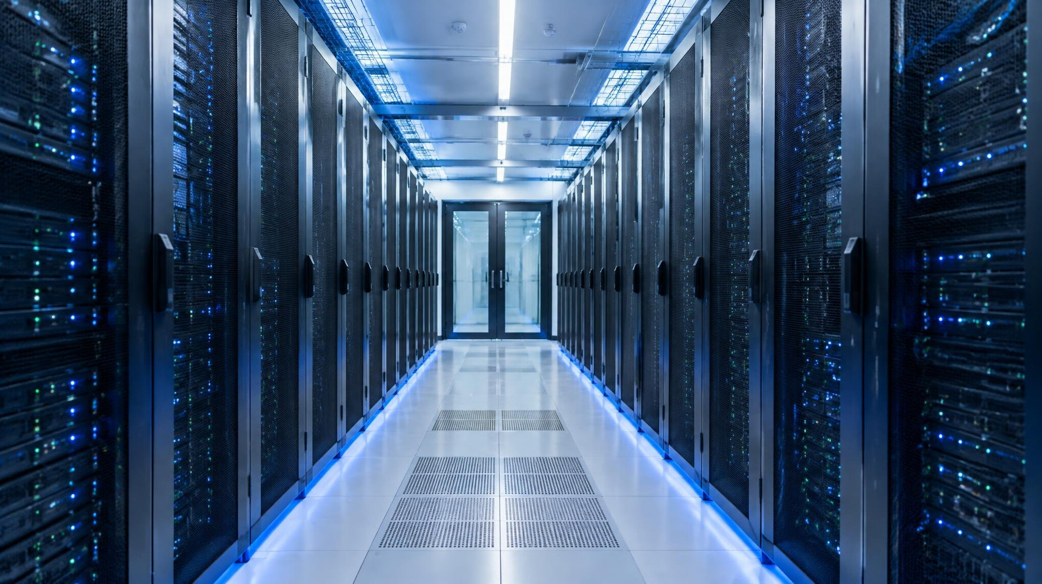 Modern data center corridor with server racks on both sides